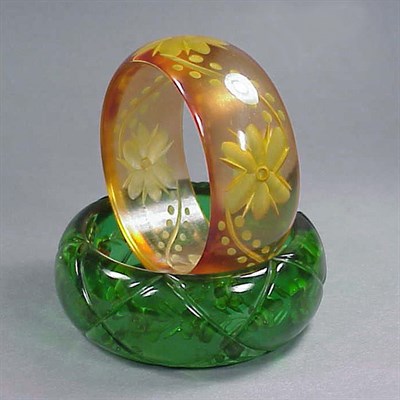Lot 273 - Two Bakelite Reverse Carved and Painted...