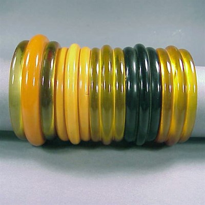 Lot 657 - Group of Five Bakelite Bracelets Each of...