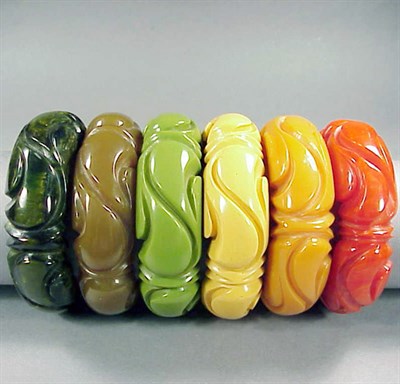 Lot 484 - Set of Six Bakelite Bracelets Each with...