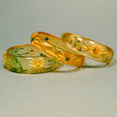 Lot 479 - Group of Three Bakelite Reverse Carved Painted...