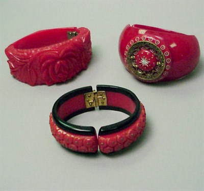 Lot 401 - Group of Three Bakelite Hinged Bracelets Each...
