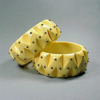 Lot 567 - Pair of Bakelite and Metal Bracelets Each in...