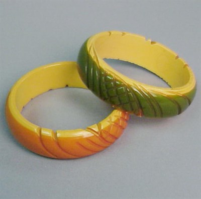 Lot 366 - Pair of Bakelite Two-Color Laminate Bracelets...