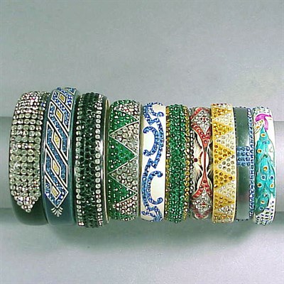 Lot 559 - Group of Ten Celluloid Rhinestone Encrusted...