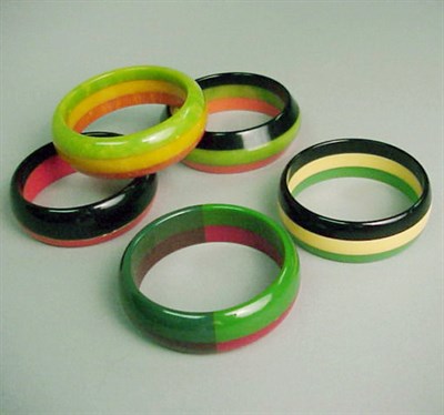 Lot 532 - Group of Five Multicolor Laminate Bracelets...