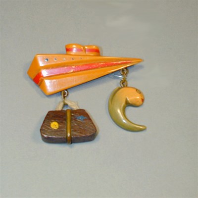 Lot 592 - Bakelite Brooch Depicting a cruise ship...