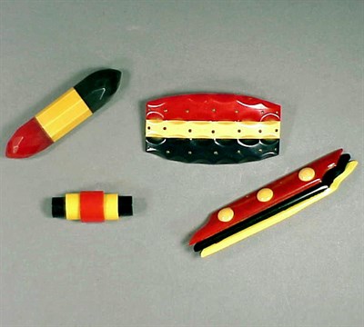 Lot 624 - Group of Four Bakelite Three-Color Brooches...