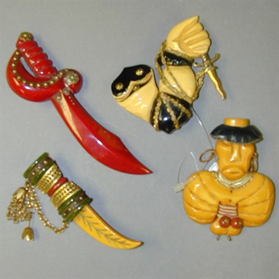 Lot 411 - Group of Four Bakelite Heraldic Brooches Each...