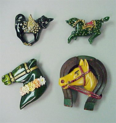 Lot 590 - Group of Four Bakelite Equestrian Brooches...