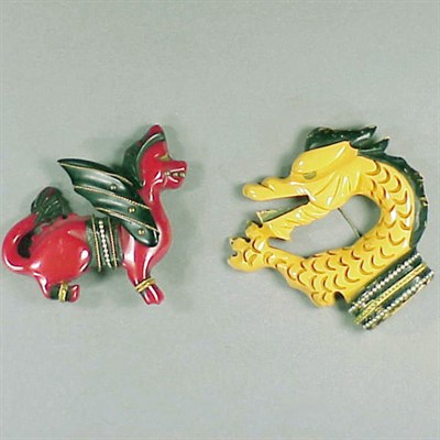 Lot 630 - Two Bakelite Metal Mounted Brooches Each...