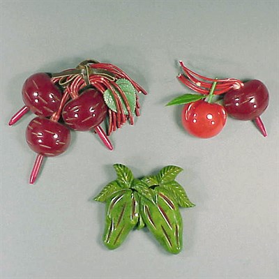 Lot 427 - Group of Three Bakelite Brooches Each...