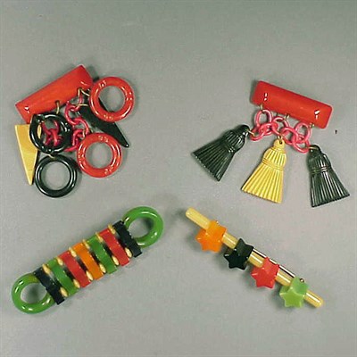 Lot 310 - Group of Four Bakelite and Celluloid Brooches...
