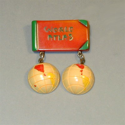 Lot 334 - Bakelite Brooch Depicting an atlas suspending...