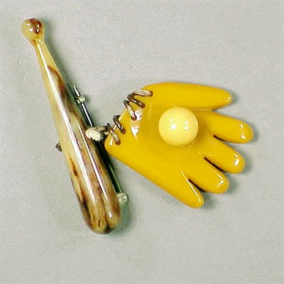 Lot 292 - Bakelite Brooch Depicting a baseball bat...