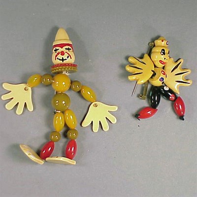 Lot 388 - Two Bakelite Articulated Figural Brooches Each...