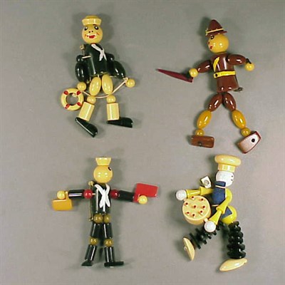 Lot 383 - Group of Four Bakelite Articulated Figural...