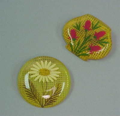 Lot 403 - Two Bakelite Reverse Carved and Painted...