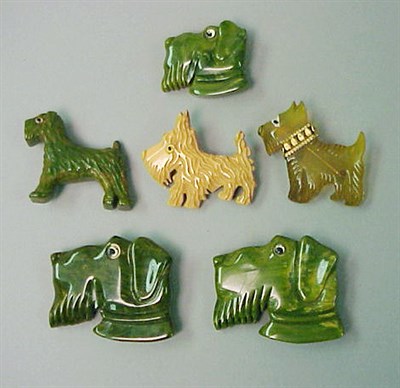 Lot 356 - Set of Three Bakelite Brooches Each depicting...