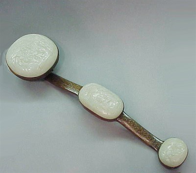 Lot 250 - Carved Jade Hongmu-Mounted Ruyi Sceptre