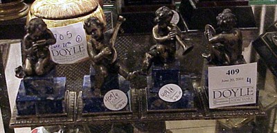 Lot 409 - Group of Four Silver and Lapis Cherubs