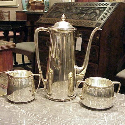 Lot 334 - Sterling Silver Three-Piece Coffee Service...