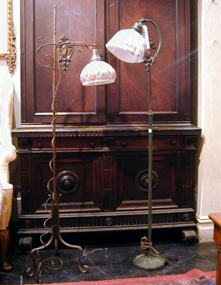 Lot 621 - Two Patinated-Metal Floor Lamps