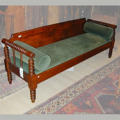 Lot 129 - American Oak Spool Turned Settee Length 6 feet.