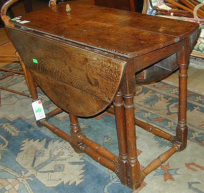 Lot 458 - George I Style Oak Gate-Leg Table