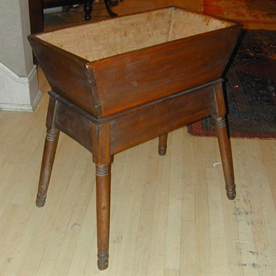 Lot 178 - American Poplar Dough Table Raised on splayed...
