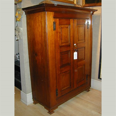Lot 405 - American Walnut Cabinet The coved cornice...