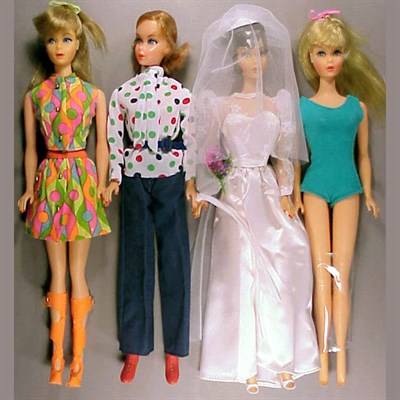 Lot 136 - Group of Four Barbies Comprising a blonde...
