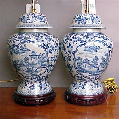 Lot 554 - Pair of Asian Style Blue and White Ceramic Lamps