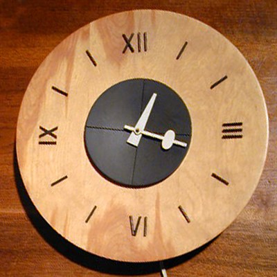 Lot 157 - Wood Wall Clock Designed by George Nelson for...