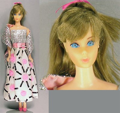 Lot 160 - Brunette Standard Barbie Original hair bow,...