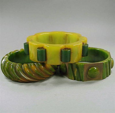 Lot 651 - Group of Three Bakelite Bracelets Each in...