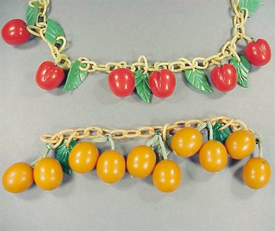 Lot 511 - Bakelite and Celluloid Necklace The chain...