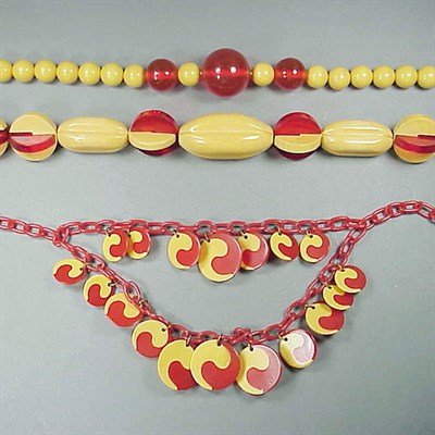Lot 525 - Group of Three Bakelite Two-Color Necklaces...