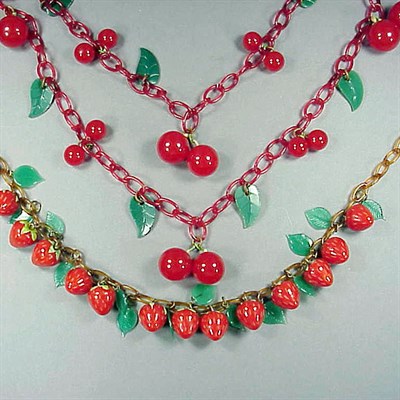 Lot 503 - Two Bakelite and Celluloid Necklaces One...