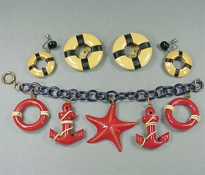 Lot 541 - Bakelite and Celluloid Bracelet The chain...