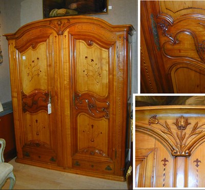 Lot 486 - Charles X Fruitwood and Marquetry Armoire The...