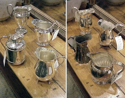 Lot 455 - Group of Eight Silver Plated Water Pitchers