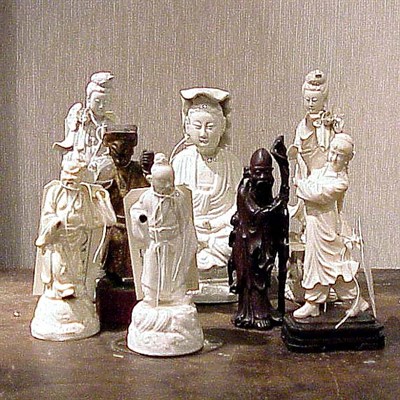 Lot 766 - Group of Eight Asian Ceramic and Wood Figures