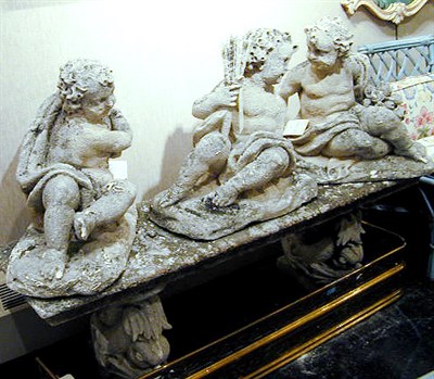 Lot 799 - Group of Three Cast Stone Putti