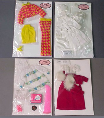 Lot 164 - Group of Four Barbie and Francie Outfits...