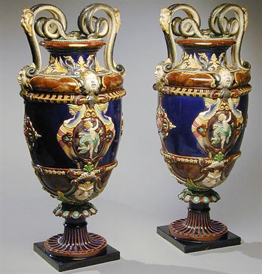 Lot 470 - Pair of Majolica Vases Each shield-shaped body...