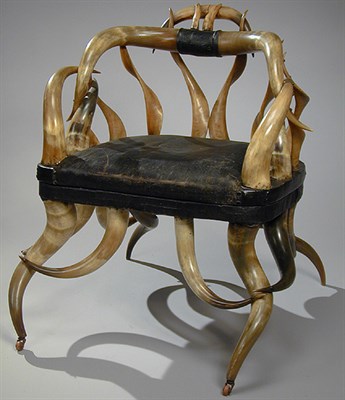 Lot 483 - Victorian Horn Armchair Upholstered in black...