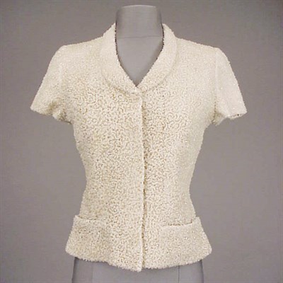 Lot 249 - Chanel Beaded Top 1990s With short sleeves,...