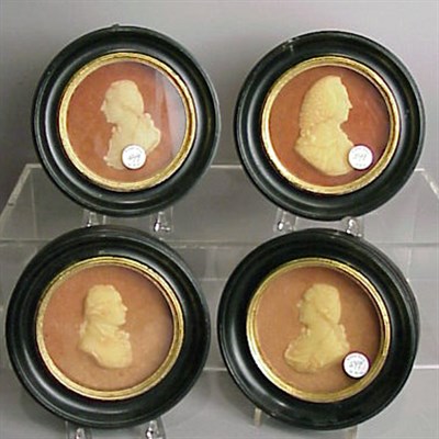 Lot 549 - Set of Four Framed Waxed Reliefs