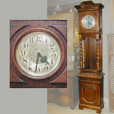 Lot 644 - Victorian Carved Oak Tall Case Clock The dial...