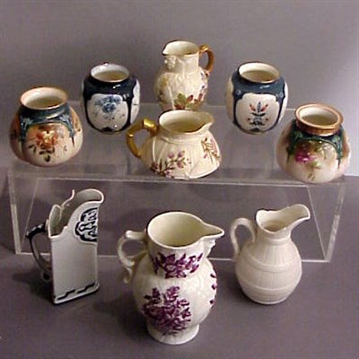 Lot 734 - Group of Five Royal Worcester Porcelain Ewers...